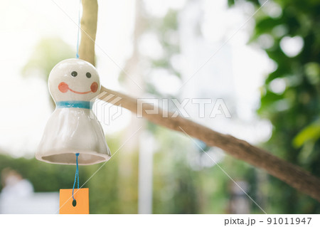 rain doll hanging in garden rain doll hanging in garden 91011947