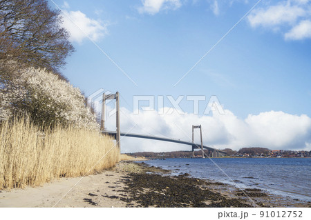 Beautiful bridge over a water passage Beautiful bridge over a water passage 91012752