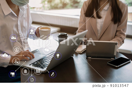 Coronavirus Office workers with mask for corona virus. Business workers wear masks to protect and take care of their health. Office working with computer. Working from cafe. 91013547