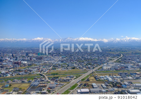 空撮・春の立山連峰と富山市 91018042