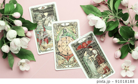 Blurred Tarot cards layout on witch table. Esoteric concept and astrology 91018188