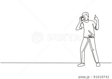 Single continuous line drawing photographer standing, thumbs up gesture, holding photo camera and photographing. Creative profession or occupation. One line draw graphic design vector illustration Single continuous line drawing photographer standing, thumbs up gesture, holding photo camera and photographing. Creative profession or occupation. One line draw graphic design vector illustration 91019742