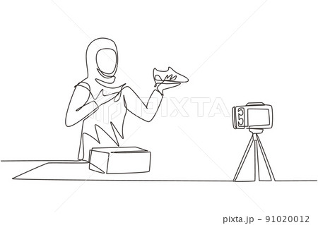 Single one line drawing beautiful Arab female fashion blogger talking about trendy sneakers while making a video for her blog. Blogging about new products, trends. Continuous line draw design vector Single one line drawing beautiful Arab female fashion blogger talking about trendy sneakers while making a video for her blog. Blogging about new products, trends. Continuous line draw design vector 91020012