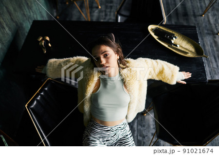 Top View of Young Girl in Fancy Outfit Top View of Young Girl in Fancy Outfit 91021674