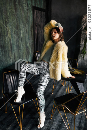 Young Woman in Club Party Outfit Young Woman in Club Party Outfit 91021677