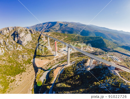 Montenegro. Bridge Moracica. Reinforced concrete bridge across the Moraci gorge. The motorway Bar - Bolyare. The bridge is on the Smokovac - Uvach - Mateshevo section. The Moracica Bridge was built by Montenegro. Bridge Moracica. Reinforced concrete bridge across the Moraci gorge. The motorway Bar - Bolyare. The bridge is on the Smokovac - Uvach - Mateshevo section. The Moracica Bridge was built by 91022726