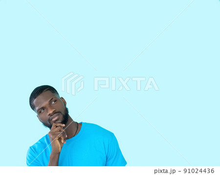 Pensive man. Offer decision. Advertising background. Interested guy with curious expression thinking of choice isolated on blue copy space. 91024436