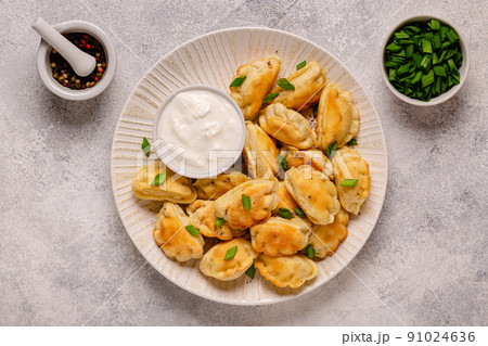 Dumplings, filled with mashed potatoes. 91024636