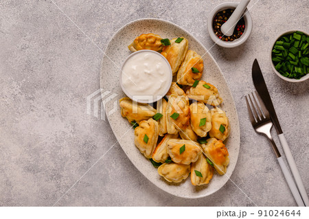 Dumplings, filled with mashed potatoes. 91024644