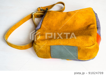 bottom view of handcrafted suede cross body bag bottom view of handcrafted suede cross body bag 91024709