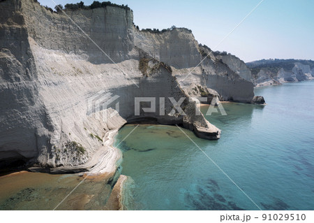 sheer white cliffs of Cape Drastis near Peroulades sheer white cliffs of Cape Drastis near Peroulades 91029510