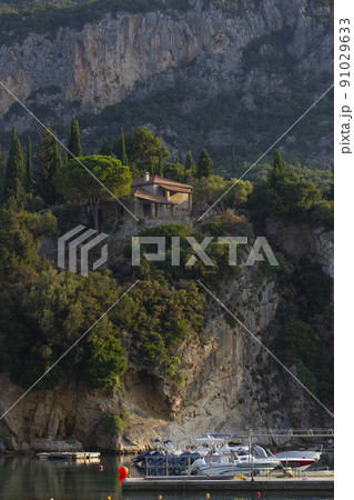 boats in the bay of Paleokastritsa at dawn 91029633