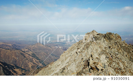 Top view of a group of tourists on a peak 91030091