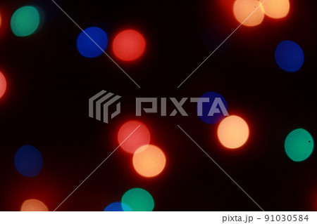Abstract bokeh background of round Christmaslight and celebrations. 91030584