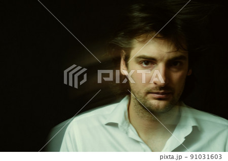 schizophrenic blurred portrait of a psychopathic man with mental disorders and disorders 91031603