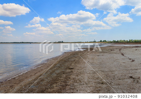 View of a salt Ustrichnnoe (oyster) lake in Kherson region, Ukraine View of a salt Ustrichnnoe (oyster) lake in Kherson region, Ukraine 91032408
