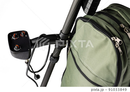 Metal detector and backpack isolated on white 91033849