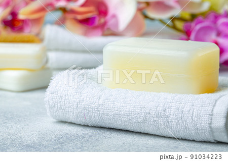Bar of natural handmade soap, towel and spa objects 91034223