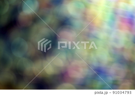 Abstract blue, purple and green blurred shapes and stripes bokeh texture. Colorful wallpaper pattern. 91034793