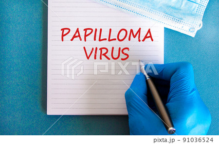 Papilloma virus symbol. White note with words Papilloma virus, beautiful blue background, doctor hand in blu glove and metallic pen. Medical mask. Medical and papilloma virus concept. Papilloma virus symbol. White note with words Papilloma virus, beautiful blue background, doctor hand in blu glove and metallic pen. Medical mask. Medical and papilloma virus concept. 91036524