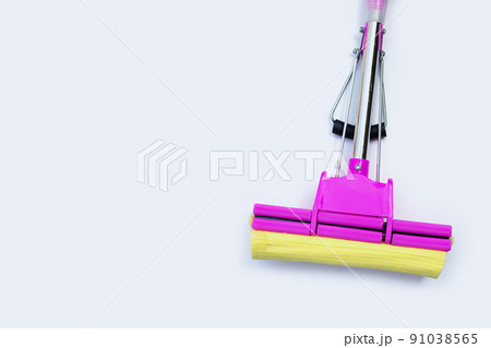 Pink yellow mop on white background. 91038565