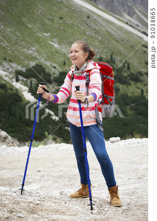 tourist girl at the Dolomites 91038665