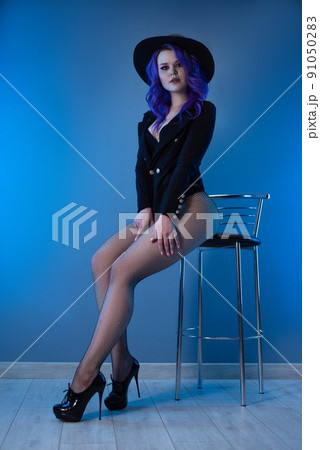 sexy girl in a fashionable jacket and hat poses erotically in her underwear sexy girl in a fashionable jacket and hat poses erotically in her underwear 91050283