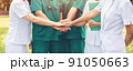 hands together between the doctor and nurses 91050663
