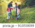 Group of kids and teacher school volunteer charity environment. 91050699
