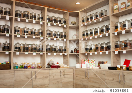 Tea shop, counter. Natural dry drink in glass jars. Tea shop, counter. Natural dry drink in glass jars. 91053891