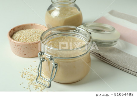Concept of tasty food with tahini sauce on white background Concept of tasty food with tahini sauce on white background 91064498