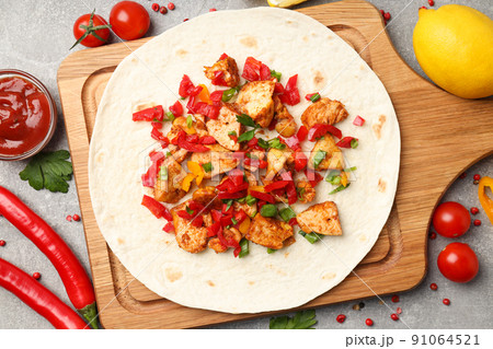Concept of tasty food with taco close up Concept of tasty food with taco close up 91064521