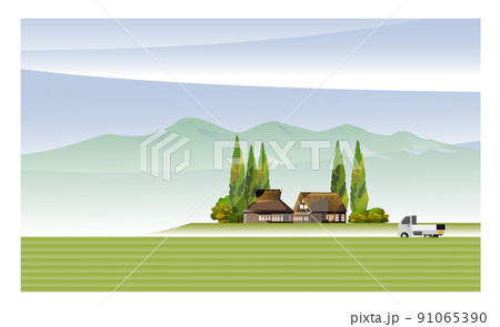 古民家のある美しい日本の山里の風景。収穫の秋、稲刈りに励む人々。 91065390