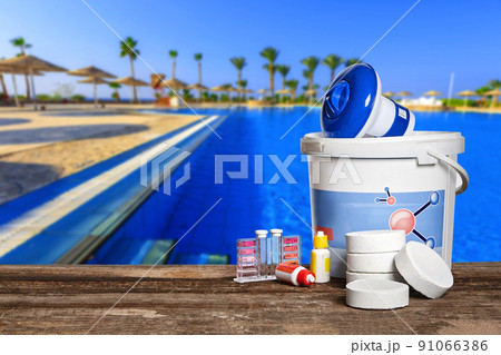 Equipment with chemical cleaning products and tools for the maintenance of the swimming pool. Equipment with chemical cleaning products and tools for the maintenance of the swimming pool. 91066386