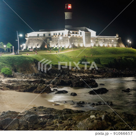 Barra Lighthouse, or Farol da Barra, in Salvador, Bahia, Brazil, at night 91066657