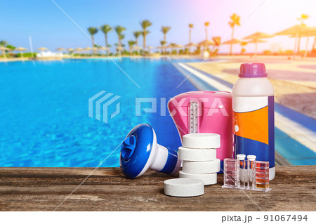Equipment with chemical cleaning products and tools for the maintenance of the swimming pool. 91067494