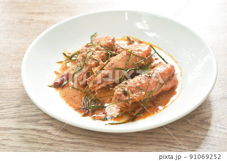 spicy stir fried river shrimp with slice grass leaf curry on plate spicy stir fried river shrimp with slice grass leaf curry on plate 91069252