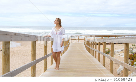 A relaxing day on a sandy beach at the ocean A relaxing day on a sandy beach at the ocean 91069428