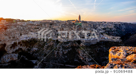Panoramic view over the city of Matera Italy at sunset Panoramic view over the city of Matera Italy at sunset 91069488