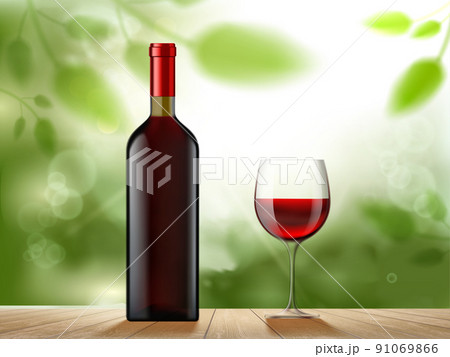 Bottle of red wine and a glass stand on a wooden table Bottle of red wine and a glass stand on a wooden table 91069866