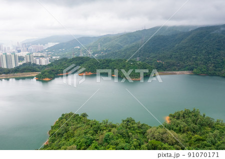 18 June 2022 the cityscape with the Upper Shing Mun Reservoir 91070171