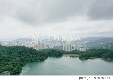 18 June 2022 the cityscape with the Upper Shing Mun Reservoir 91070174