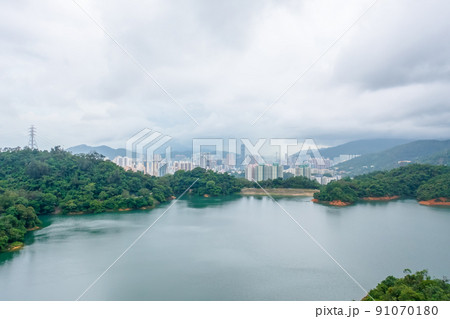 18 June 2022 the cityscape with the Upper Shing Mun Reservoir 18 June 2022 the cityscape with the Upper Shing Mun Reservoir 91070180