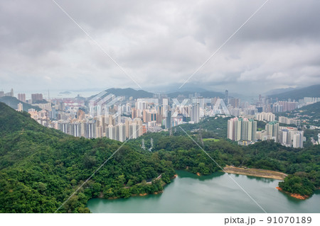 18 June 2022 the cityscape with the Upper Shing Mun Reservoir 91070189
