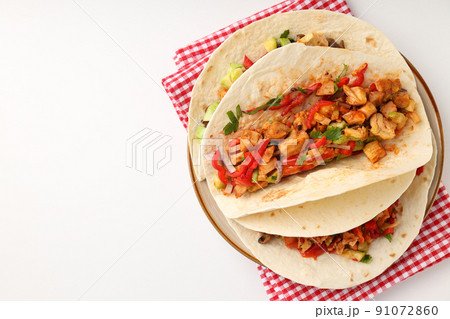 Concept of tasty food with taco on white background Concept of tasty food with taco on white background 91072860