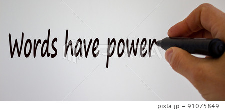 Hand writing 'words have power', isolated on beautiful white background. Concept. 91075849