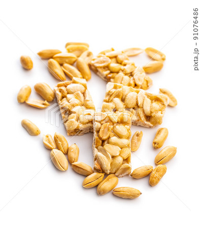 Sweet peanut bars isolated on white background. 91076486