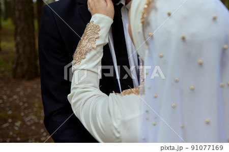 National wedding. Bride and groom. Wedding muslim couple during the marriage ceremony. Muslim marriage. 91077169