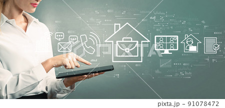 Telework theme with business woman using a tablet 91078472