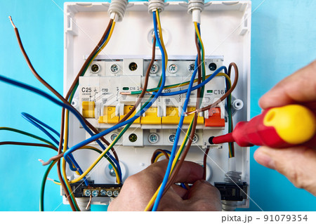 Installing of single phase consumer unit for household electrical network. 91079354